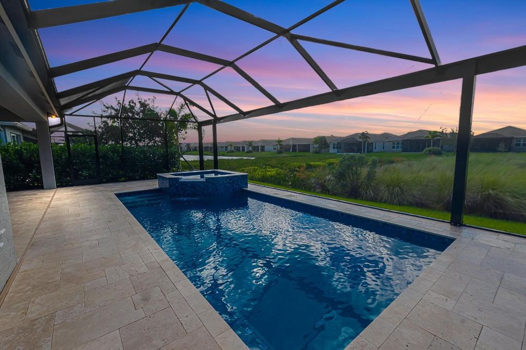 Photo of 11973 SW Coral Cove Parkway, Port Saint Lucie, FL 34987 (MLS # R11135316)