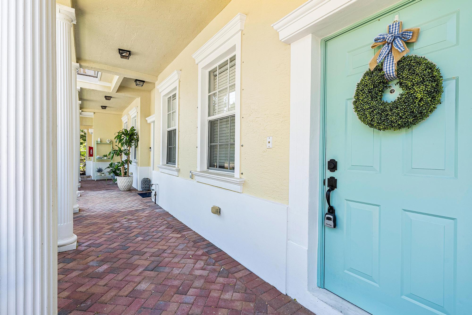 Welcome to your fully remodeled and updated 2-bedroom 2.5 bathroom + den with 2 car garage Townhome in Botanica, a community of Jupiter Florida. This charming property boasts modern amenities and thoughtful renovations, ensuring a lifestyle of comfort and convenience. Step inside to discover new luxury vinyl plank flooring that promotes both elegance and durability, setting the stage for a seamless blend of style and functionality throughout the home. Additionally, the expansive den presents endless possibilities, serving as a versatile space that can easily be utilized as a third bedroom or a dedicated home office. The kitchen has been reconfigured and extended to offer an open floor plan, enhancing both the aesthetic appeal and practicality of the space. Brand-new stainless-steel