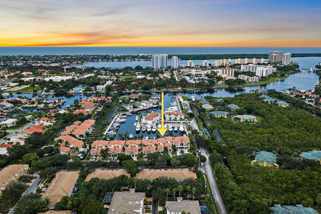 Photo of 1412 HARBOUR POINT Drive, North Palm Beach, FL 33410 (MLS # B26084882)