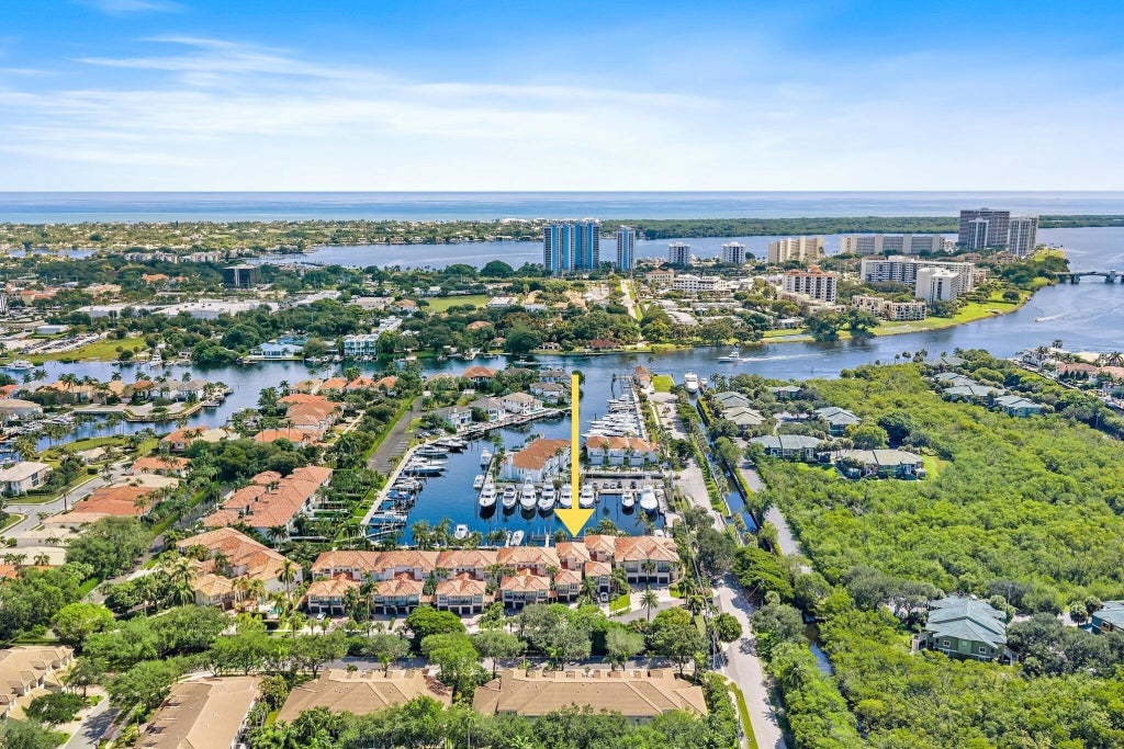Photo of 1412 HARBOUR POINT Drive, North Palm Beach, FL 33410 (MLS # B26084882)