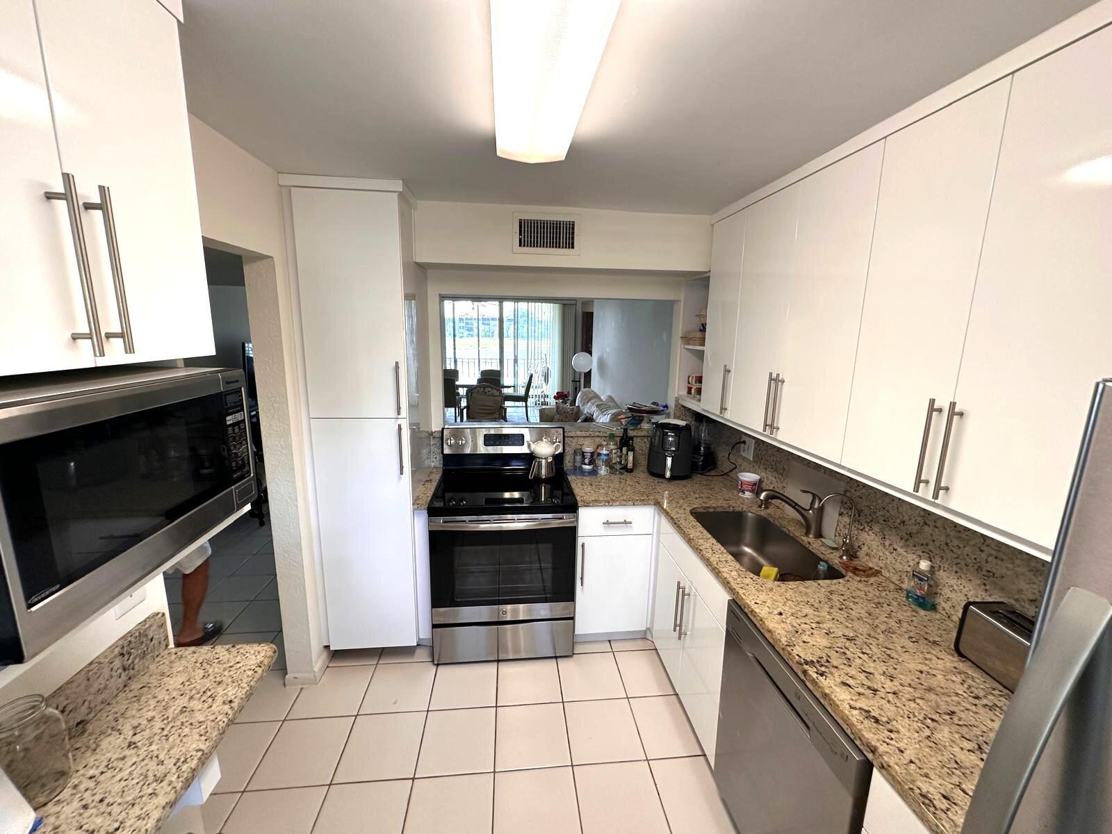 Welcome to this cozy, tastefully decorated 55+ first floor condo located in a gated community with 24/7 security patrol. Available November 17, 2025 | Seasonal or Annual | Furnished or Unfurnished This turnkey unit features tile flooring throughout and an in-unit laundry for your convenience! Enjoy peace of mind and a hassle-free lifestyle in this beautifully maintained home. Located close to shopping and restaurants.