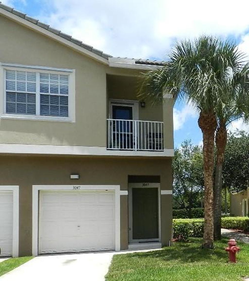 Photo of 3047 Grandiflora Drive Dr, Green Acres, FL 33467 (MLS # R10754936)