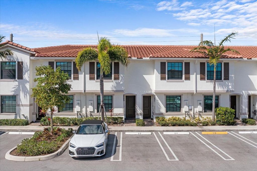 Photo of 5049 Genove Place, Riviera Beach, FL 33410 (MLS # R10964317)