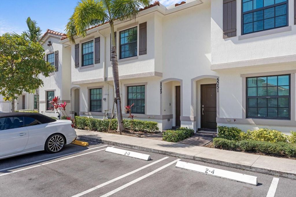 Photo of 5049 Genove Place, Riviera Beach, FL 33410 (MLS # R10964317)