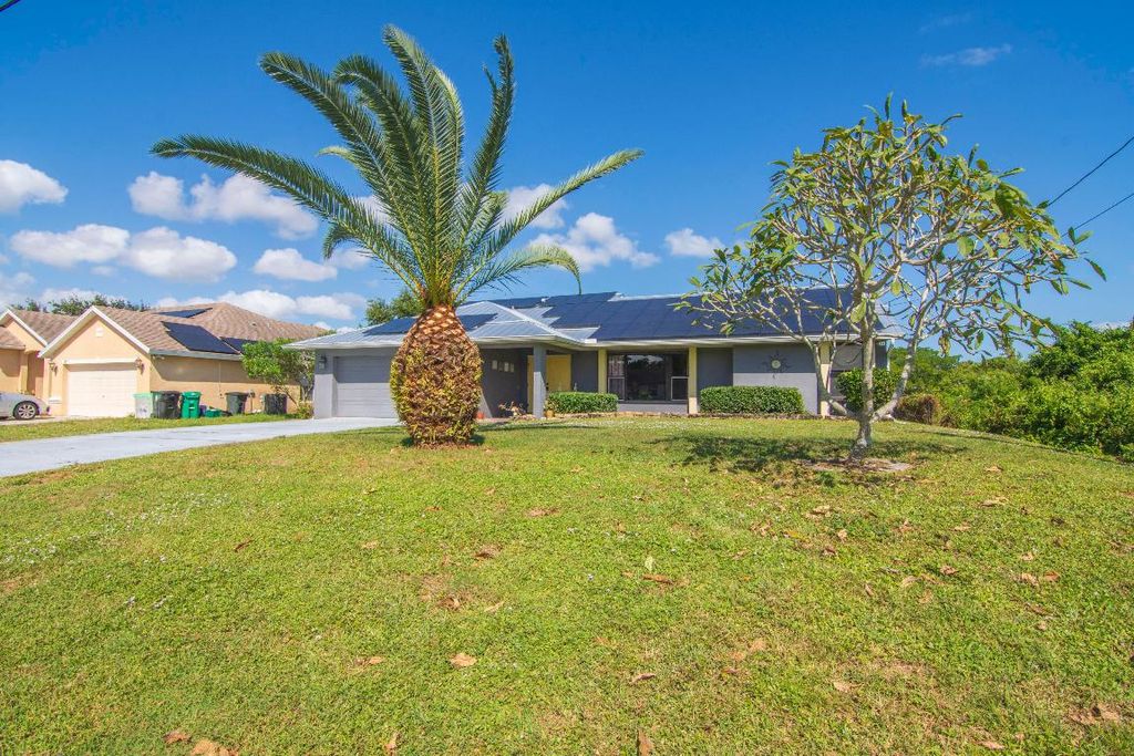 Photo of 111 SW Glenwood Drive, Port Saint Lucie, FL 34984 (MLS # R10935202)