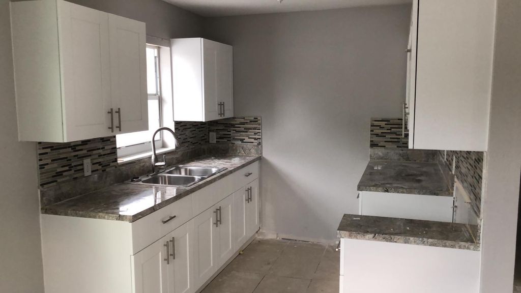 Photo of 5900 N Haverhill Road, West Palm Beach, FL 33407 (MLS # R11038157)