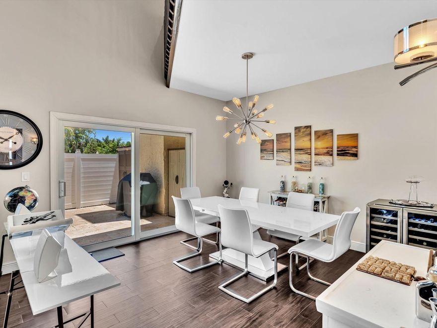 As seen on TV! Soaring wood vaulted ceilings, fully remodeled townhome with and working fireplace, located just North of Oakland Park Blvd. in the heart of it all! This boutique 4 home community with low HOA, offers residents 2 parking spots each, pool, and beautifully manicured landscaping. Also featuring- new kitchen with new appliances, contemporary designed bathrooms, new water filtration system, and a large fenced in patio with beautiful stones that opens to the pool. Other attributes: impact windows and doors, porcelain tile floors, equipped for generator, modern lighting, bonus loft area for your office and/ or gym and the roof was replaced in 2019. Location is unbeatable, just 5 minutes to the beach, 12 minutes to Las Olas, 10 minutes to SR95, grocery, dining, hospitals and more! Find this home featured on American Dream TV!