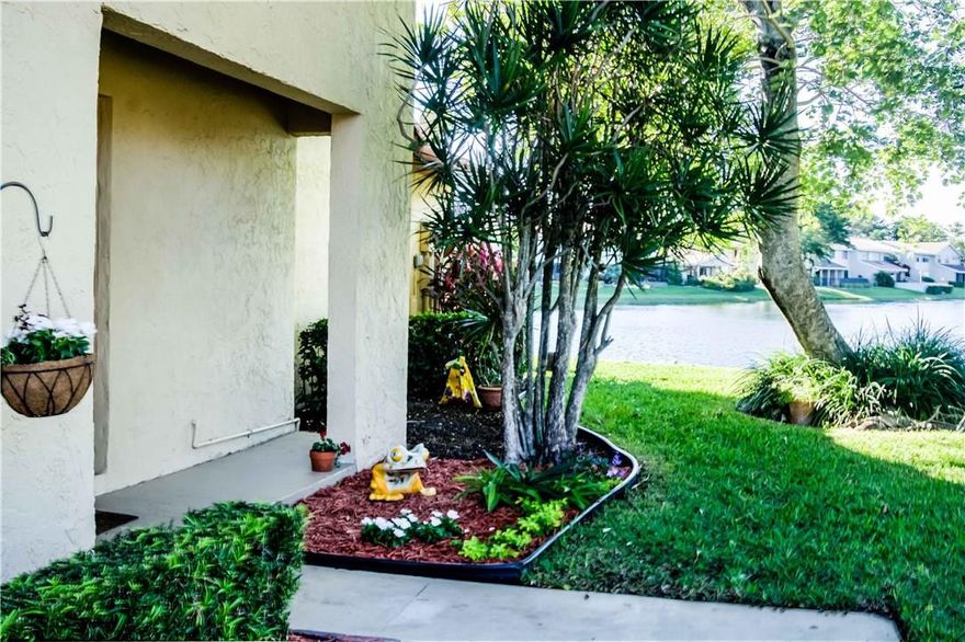 Gorgeous water views - 3 bedroom/2bath villa open patio direct water location, corner unit. Fresh interior paint plus ceilings, neutral tones. Kitchen updated - wood cabinets granite counter tops, tile backsplash and bar seating. Open living area vaulted ceilings. Split bedroom floor plan - guest bath travertine tile new vanity mirror and lights. Master bedroom has private bath and walk in closet. Master bath new vanity granite top lights - Interior has extended living area. Community pool and clubhouse.