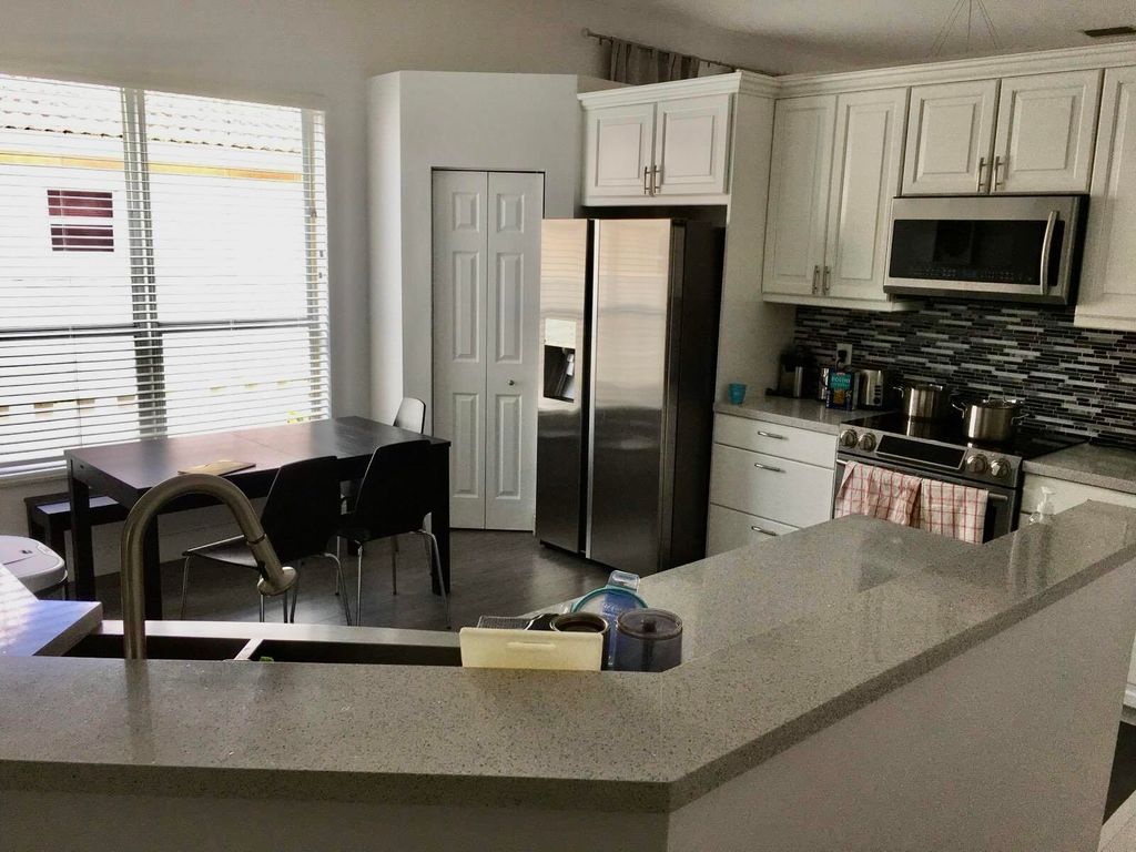 Photo of 14272 NW 18th Court, Pembroke Pines, FL 33028 (MLS # B26040564)