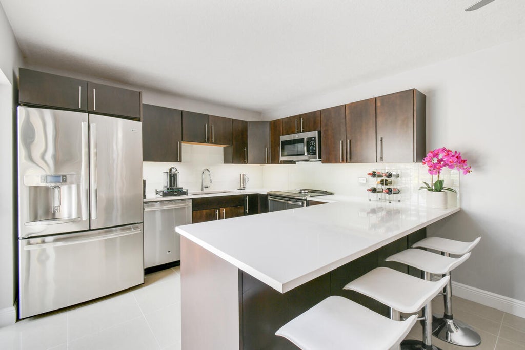 Photo of 213 2nd Terrace, Palm Beach Gardens, FL 33418 (MLS # R10972514)