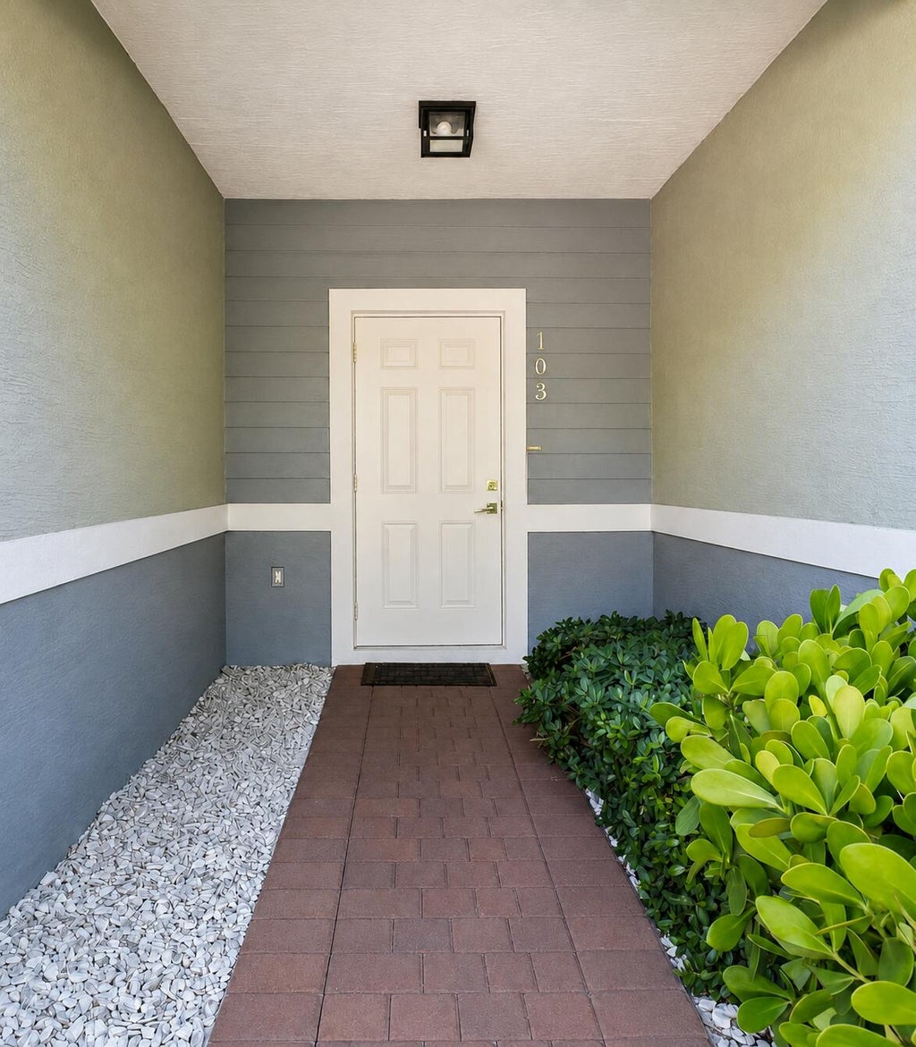 Photo of 1030 CRYSTAL Way #103, Delray Beach, FL 33444 (MLS # B26068897)
