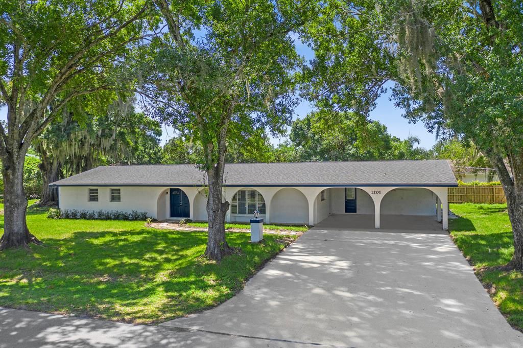 Photo of 1201 Country Gardens Lane, Fort Pierce, FL 34950 (MLS # R10685352)