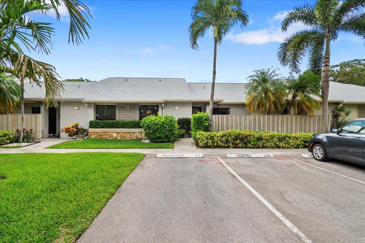 Come check out this beautiful highly sought after 1 story villa with a stunning lake view in Coconut Creek before it's too late. Rarely available waterfront villa in the desirable Karanda Village of The Township. This unit features a split bedroom plan, vaulted ceilings, enclosed patio, large master with large walk-in closet, inside laundry room and room to have a barbeque on the front patio. Close to everything in South Florida: Festival Flea Mkt; Casino; Butterfly World etc. Community features a pool, and the Township Community Master association features a pool, theater and so much more.