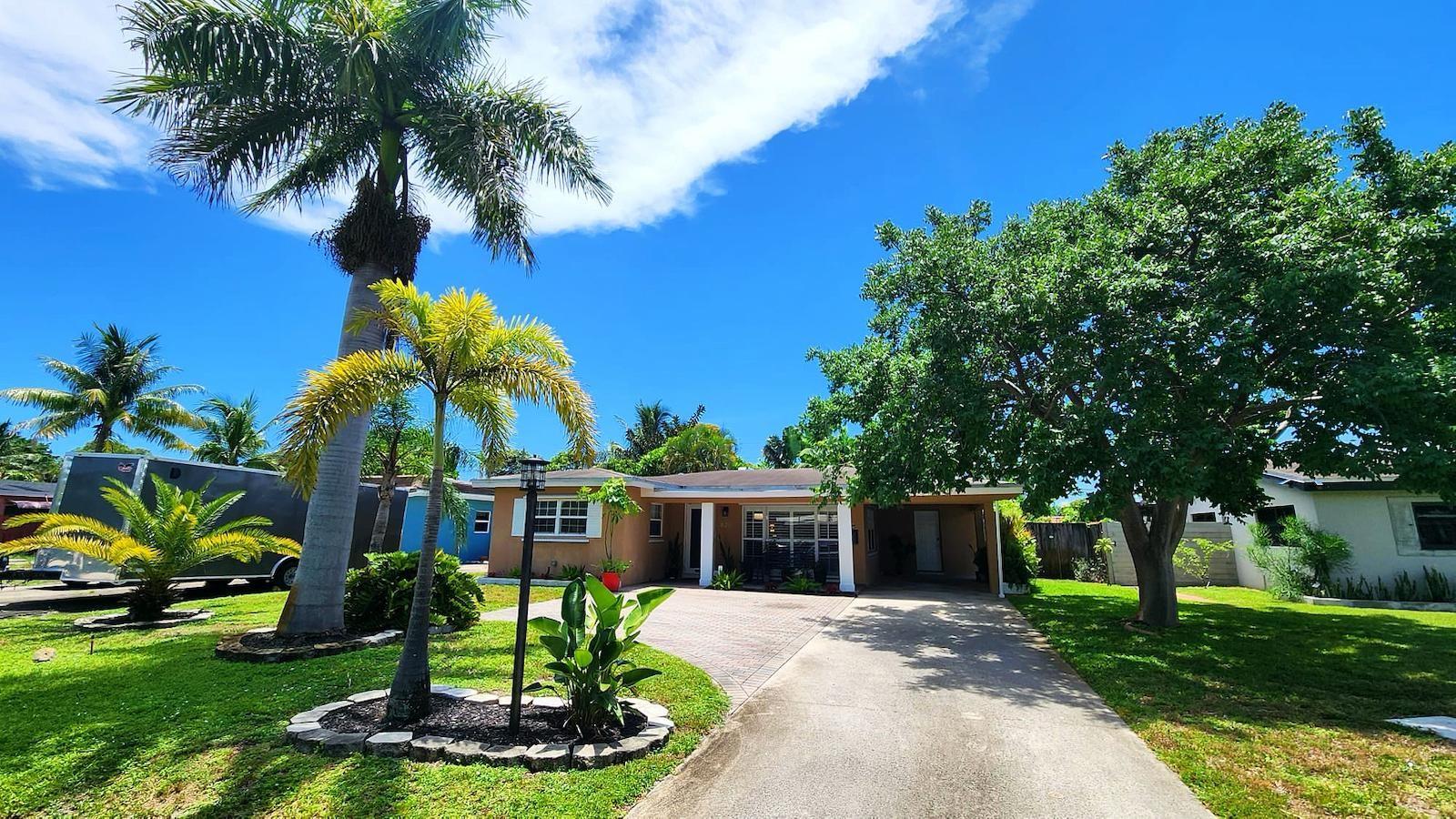 Discover this beautifully maintained 2 bed, 1 bath pool home in vibrant Oakland Park! The spacious family room easily converts to a 3rd bedroom—owner has the doors. Step outside to your private tropical oasis featuring a sparkling saltwater pool, perfect for relaxing or entertaining and a large shed for extra storage. Enjoy peace of mind with a 2024 A/C, and a 3-year-old water heater, impact doors, and hurricane rated shutters. No HOA means more freedom and flexibility. Nestled in a prime location close to beaches, dining, and nightlife, this home blends comfort, convenience, and South Florida charm. A true hidden gem! Schedule a private showing and make yourself at HOME!