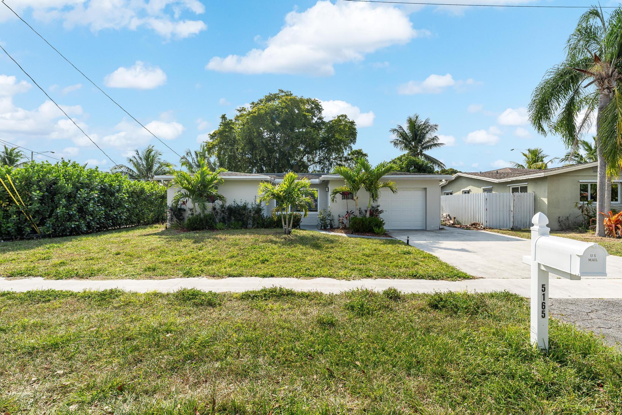 Welcome to this beautifully remodeled 3 bed, 2 bath home in the heart of Cooper City. Step inside to discover a bright, open concept floor plan featuring modern finishes, flowing oversized tile, and abundant natural light. The fully renovated gourmet kitchen boasts quartz countertops, stainless steel appliances, custom cabinetry, and a spacious island, perfect for entertaining.
The primary suite offers a spa-like bathroom with a walk-in shower and stylish fixtures. Generously sized bedrooms with ample closet space. A second upgraded bathroom perfect for guests and family. Enjoy the fenced backyard—ideal for gatherings, pets, or even a future pool! Also featuring impact windows and doors, newer roof, and a spacious driveway. Don’t miss your chance to own a piece of Cooper City paradise!
