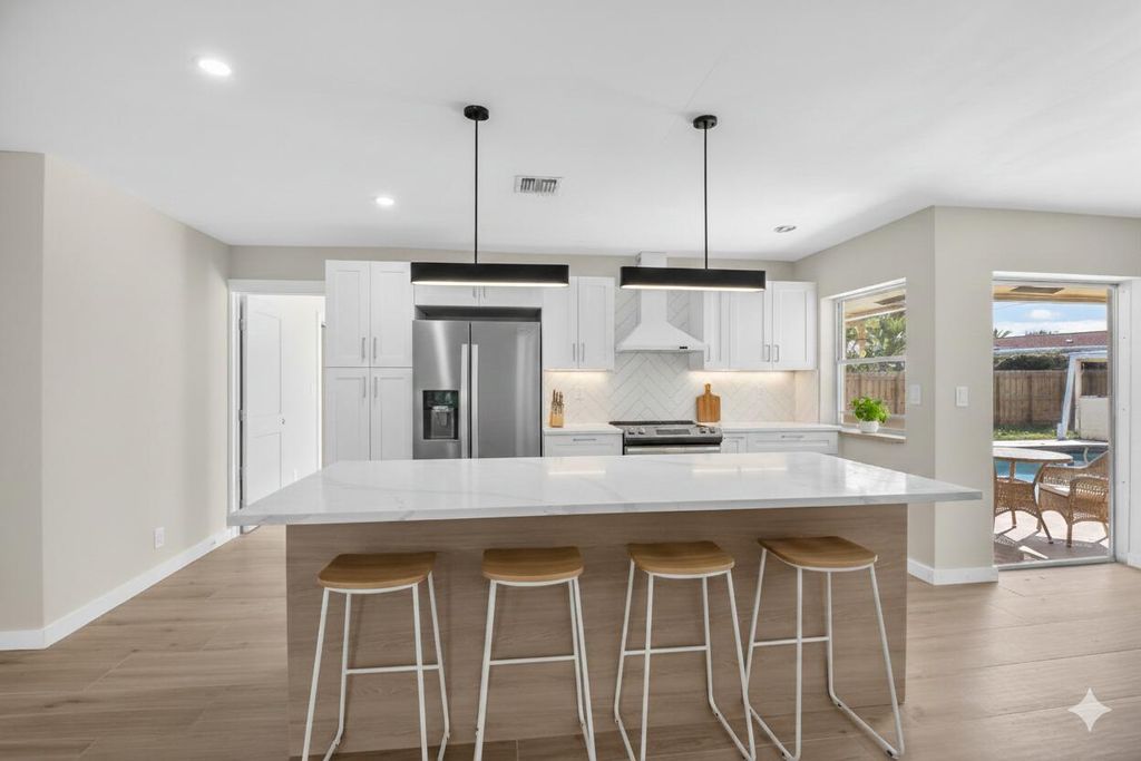 Photo of 4347 NW 2nd Court, Boca Raton, FL 33431 (MLS # R11161384)