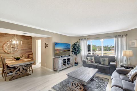 Photo of 3951 Via Poinciana #415, Lake Worth, FL 33467 (MLS # R11156072)