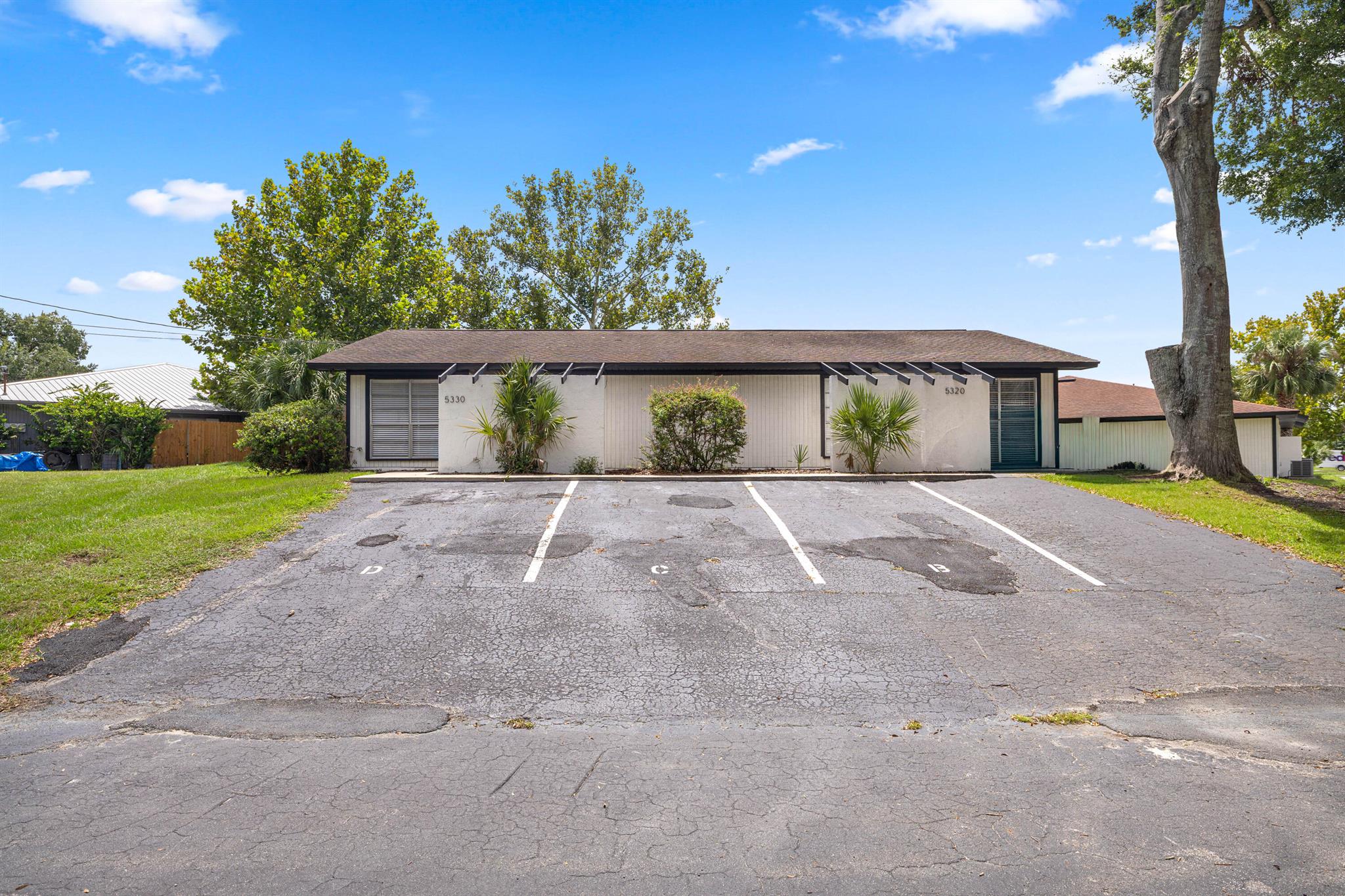 Located within community of The Greenfields in the desires SE area of Ocala conveniently located near Forest High school and with close proximity to shopping centers and local parks. This unit offers 2 bedrooms and 2 bathrooms. Kitchen has stainless steel appliances, quartz countertops and equipped with a dishwasher. There are washer and dryer hookup for your convenience. Primary bedroom has an ensuite bathroom. Second bedroom is ample and full bathroom is located right off the hallway. Notable features included : blinds on windows, ceiling fans, central AC and heat, private patio, private parking, Marion County Utilities for water, City of Ocala for Electric and there is a $45 fee trash and sewer. Verifiable income of 2x the rent, background and credit check required
