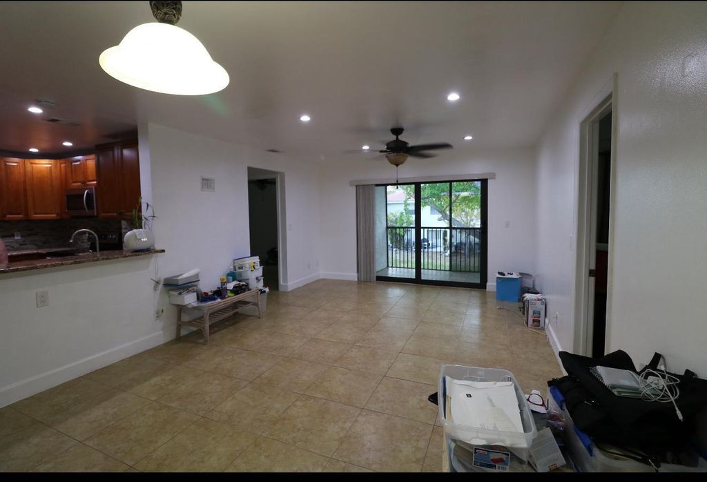Photo of 11333 Royal Palm Blvd #E-1, Coral Springs, FL 33065 (MLS # B26000999)