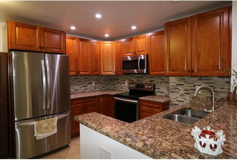 Photo of 11333 Royal Palm Blvd #E-1, Coral Springs, FL 33065 (MLS # B26000999)