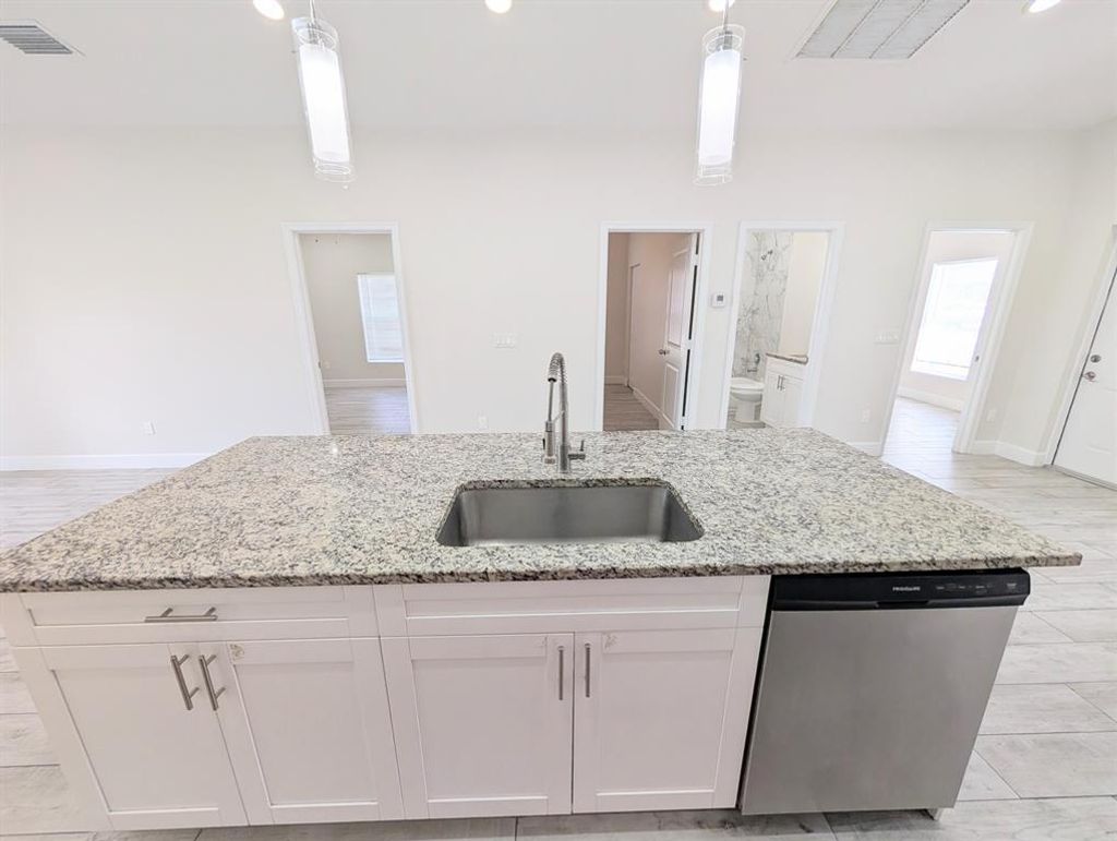 Photo of 1566 W 26th Court, Riviera Beach, FL 33404 (MLS # B26018881)