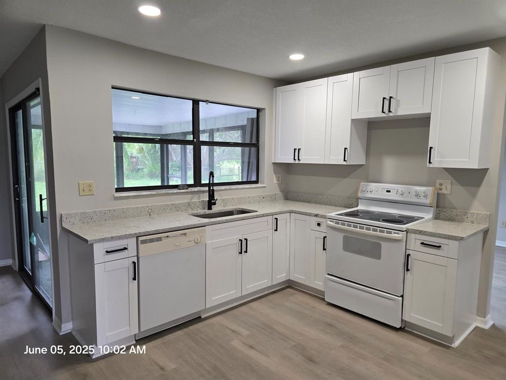 Photo of 427 SE Galleon Lane, Port Saint Lucie, FL 34983 (MLS # R11124162)