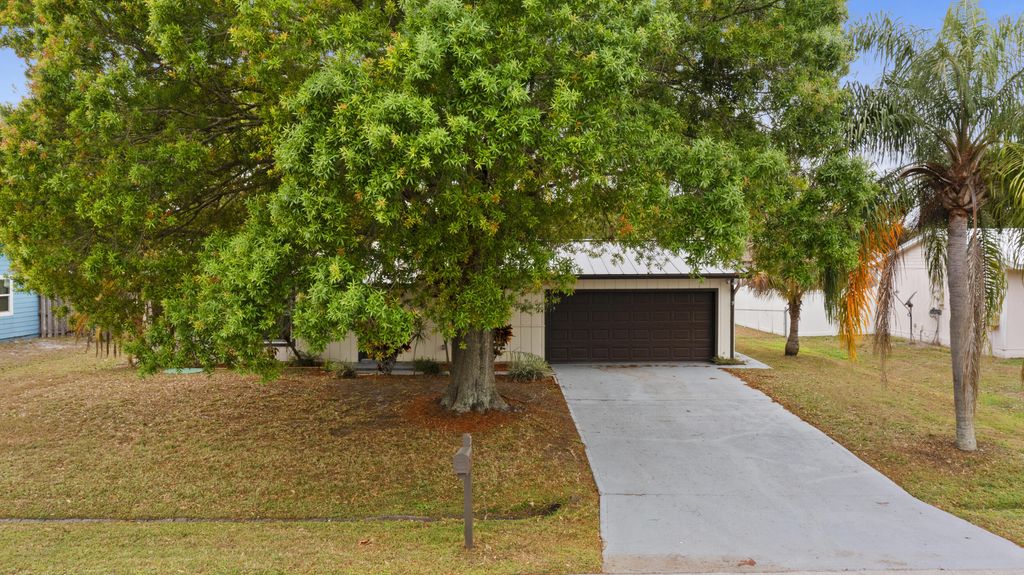Photo of 762 NE Lanfair Street, Port Saint Lucie, FL 34983 (MLS # R11159792)