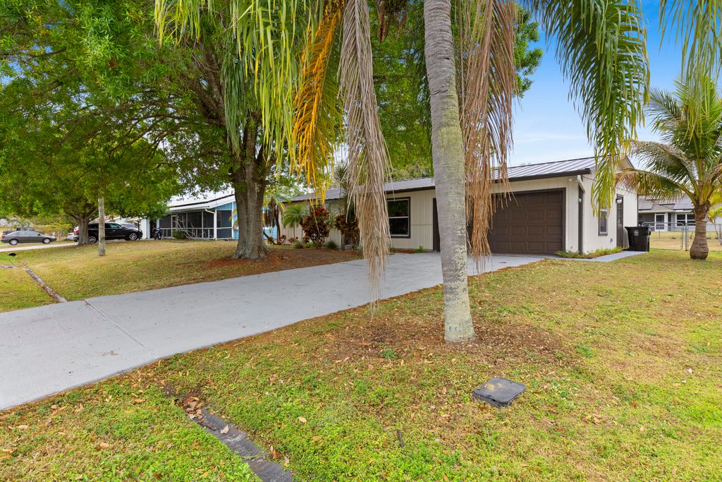 Photo of 762 NE Lanfair Street, Port Saint Lucie, FL 34983 (MLS # R11159792)