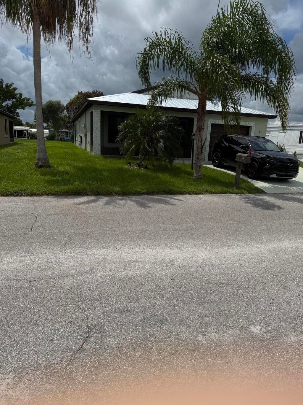 Photo of 59 EL CAMINO REAL, Port Saint Lucie, FL 34952 (MLS # B26072448)