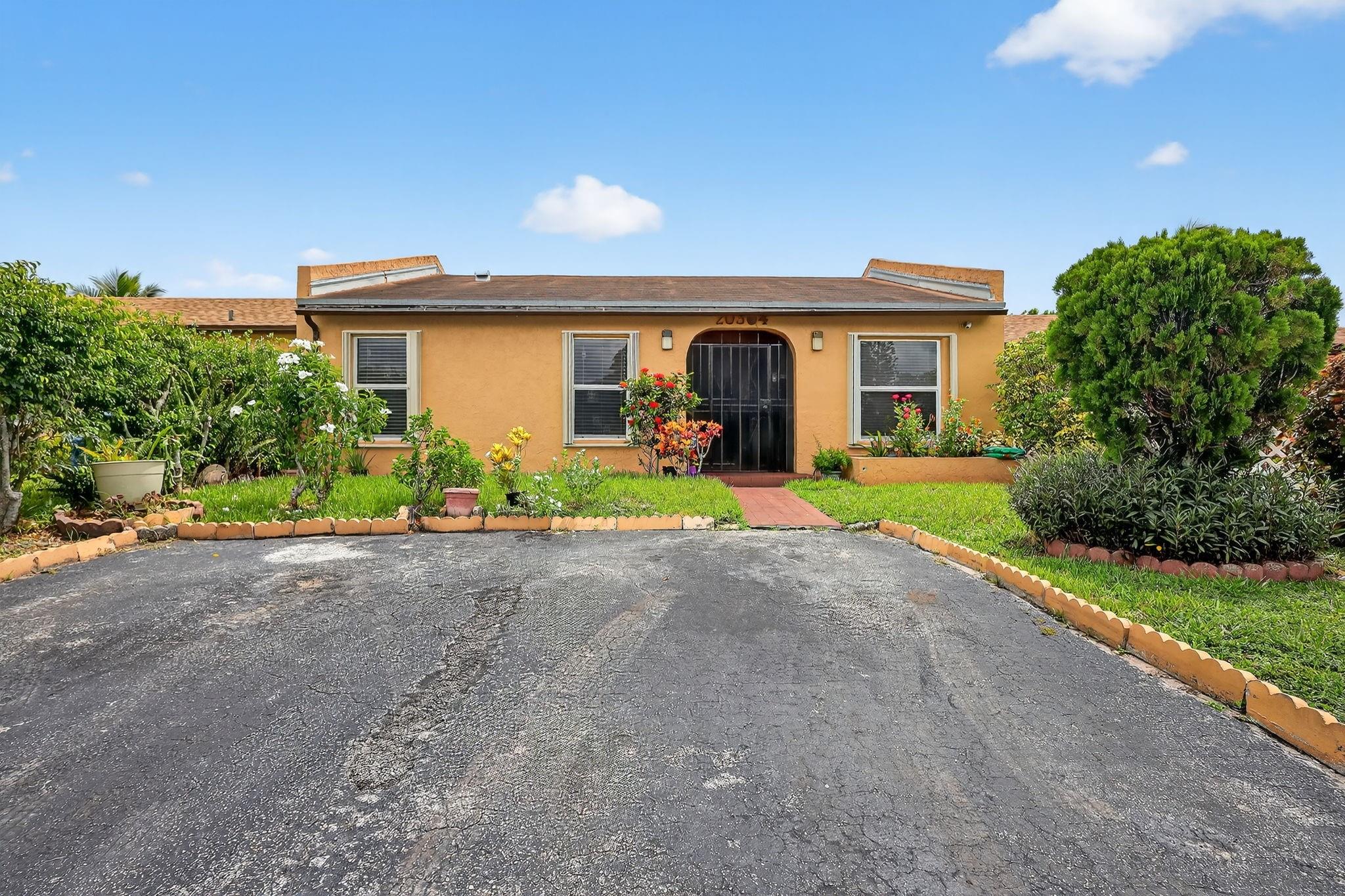 Welcome to this beautifully updated 3-bedrooms 2-bath home in the heart of Miami Gardens' Leslie Estate Community. Home features a modern kitchen and updated bathrooms. Recently installed hurricane impact windows, elevated ceilings and stylish tile and wood flooring throughout. The spacious master suite offers ample closet space while the backyard includes fruit trees and a covered partio perfect for entaining. Conveniently located, within walking distance, to the Betty T Ferguson Community Center. It is 5 minutes from the Miami Grand Prix, Hard Rock Stadium, the Miami Dolphin's Training Camp and the Miami Tennis Open and about 10-15 minutes from the Aventura and Pembroke Pines Malls. Your search is complete here as this home combines comfort, style and unbeatable location!