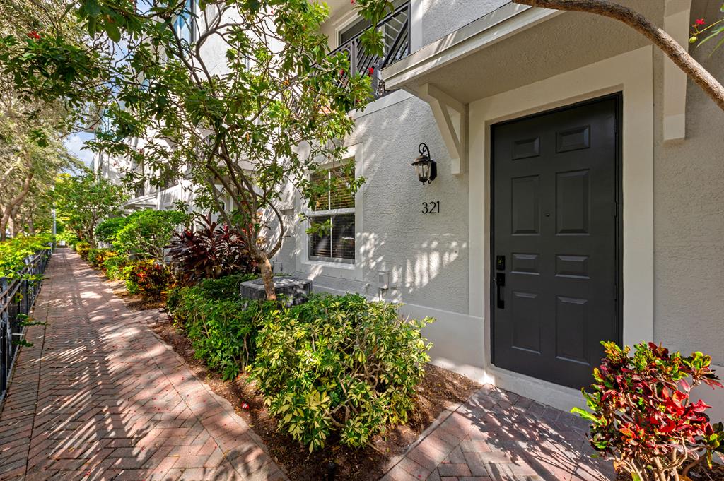 Be the first to live in this newly remodeled townhome in the heart of downtown Delray! This partially furnished home offers upgrades that include: new impact windows, kitchen redesign with upgraded cabinets and Taj Mahal quartzite that features a vast island waterfall. Den/ home office/workout room with custom cabinetry. Master bedroom is spacious, very bright and features two custom closets with a third, shoe closet, in the hall! Custom closets are throughout and laundry has new washer & dryer. Entire unit is newly painted in designer colors with new ceiling fans, light fixtures, window treatments and Halo electronic lock. Your double car garage offers off street parking downtown with additional parking outside your unit! Residents love the secluded heated community pool with newly landsc