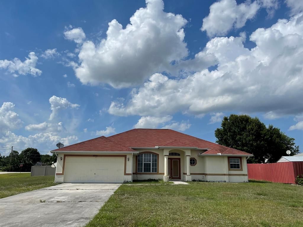 Photo of 5961 NW Brenda Circle Cir, Port Saint Lucie, FL 34986 (MLS # R10828170)