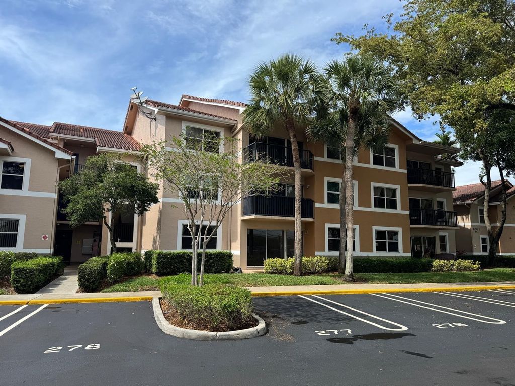 Photo of 8955 Wiles Road #206, Coral Springs, FL 33067 (MLS # B26030204)
