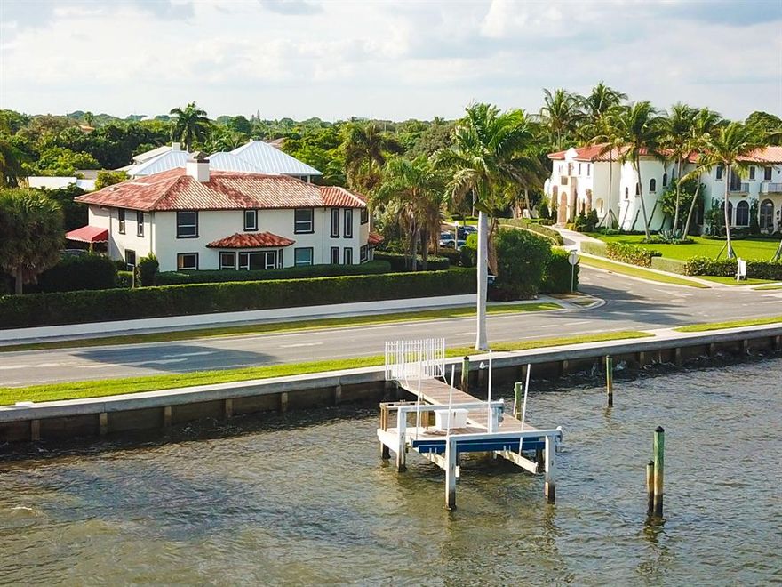 Intracoastal access and views from this updated two story home on a large corner lot on Flagler Drive. Your private boat dock out front and no fixed bridges gives you access up and down the intracoastal waterway for whatever fun you have planned for the day. Five bedrooms and five and half baths, chef's kitchen, oversized three car garage, whole house generator, heated pool and private patio and yard. Minutes to Palm Beach, PBIA, WPB downtown, walk outside and take the Flagler walk/bike path anywhere your heart desires.