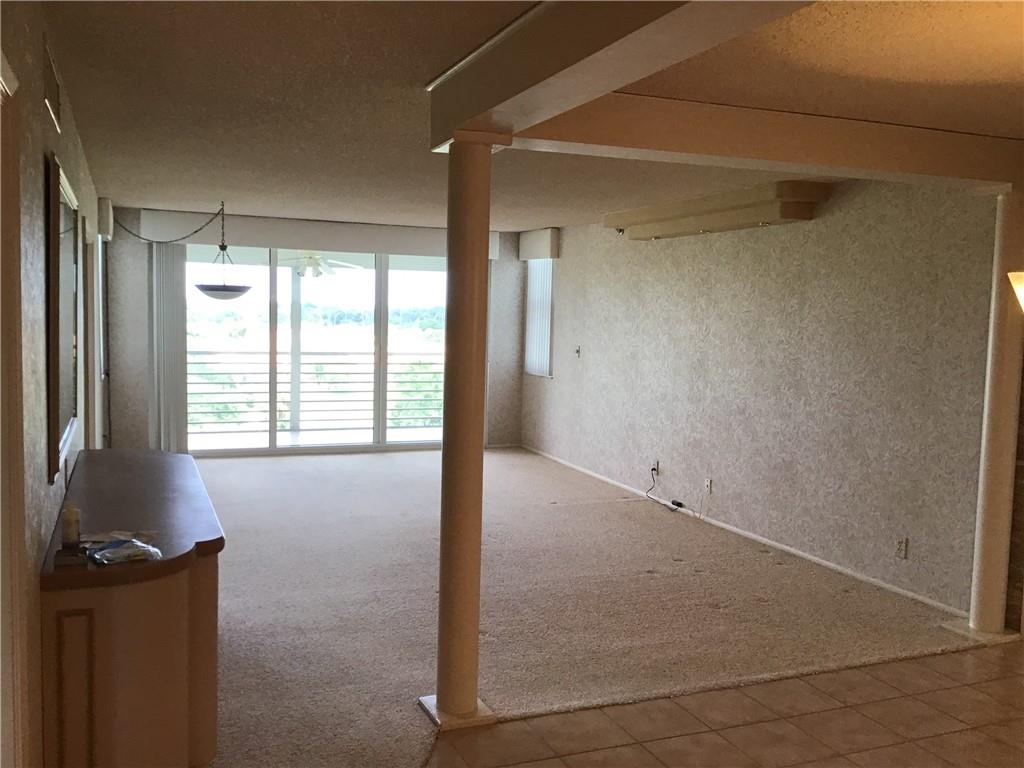 Spacious 3/2.5 with fabulous screened in balcony views of golf course and lake. This very clean apartment is located on prestigious Oaks Way in PalmAire, with tile and carpeting throughout and a washer/dryer in the unit. Many windows are impact glass, including large sliding doors to screened in patio. Large heated/cooled pool, BBQ facilities, clubhouse for cards and social events, designated parking. Steps to walking/biking paths. Very close to community park, Publix and large community center. Minutes to shopping, restaurants and Harrah's Casino.