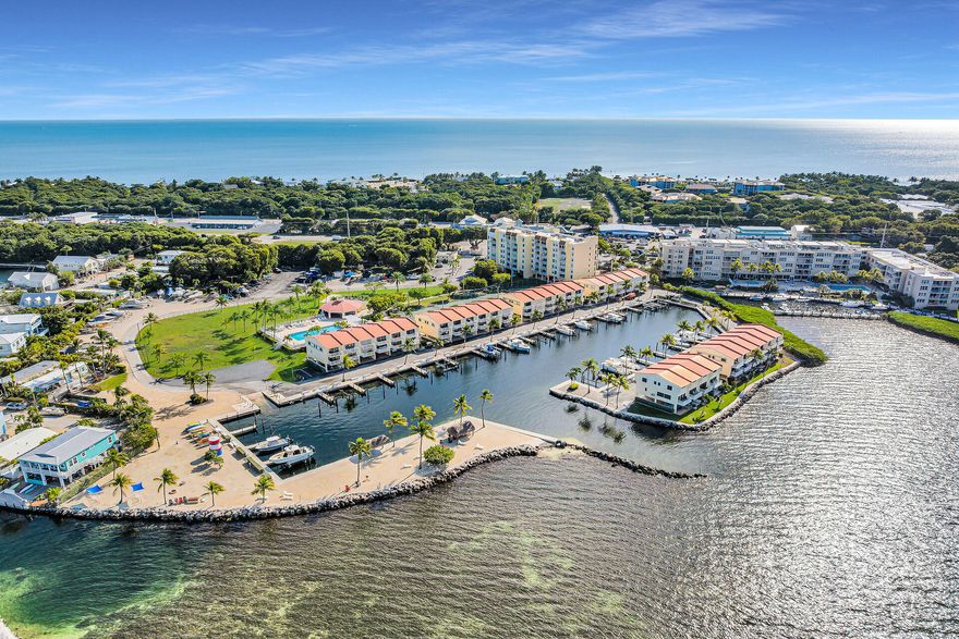 Welcome to Futura Yacht Club!  Your island getaway awaits in this highly desirable Plantation Key community.   Unit 304 is a 2 bed, 2 bath beautifully maintained condo. Florida Bay views make this third floor perch heavenly. A hideaway murphy bed is an additional feature adding to the desirability of this coastal condo as an ideal second home or rental.  Owners and renters benefit from extensive community amenities, including a boat ramp, on-site boat and trailer storage, a large pool with adjacent club area, kayak storage, paddeball and basketball courts, and well-maintained grounds with shaded picnic areas. The on-site management team maintains the serenity of this community.   Excellent boating from this location - easy ocean and Bay access and fabulous sunset viewing.