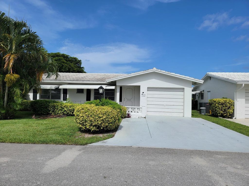 Photo of 1308 SW 23rd Street, Boynton Beach, FL 33426 (MLS # R11006868)