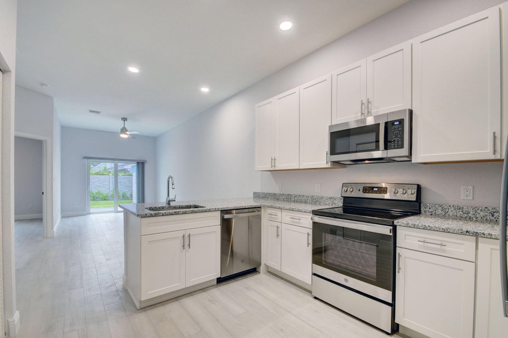 Photo of 703 DAWN Place #C, Lantana, FL 33462 (MLS # B26079076)
