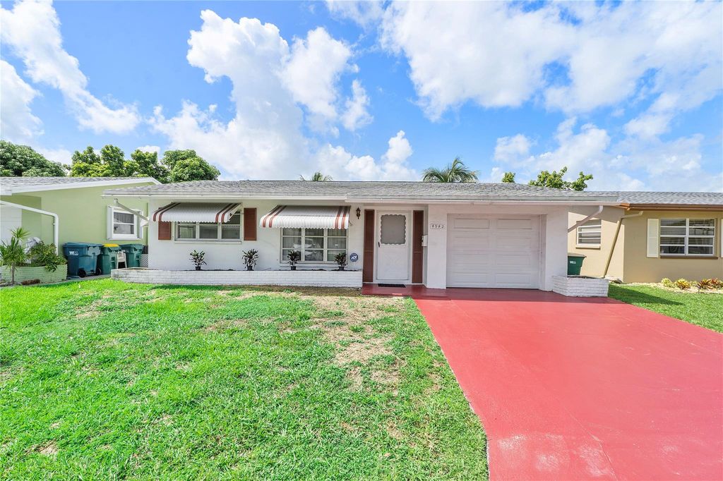 Photo of 4942 NW 55th St, Tamarac, FL 33319 (MLS # F10452869)