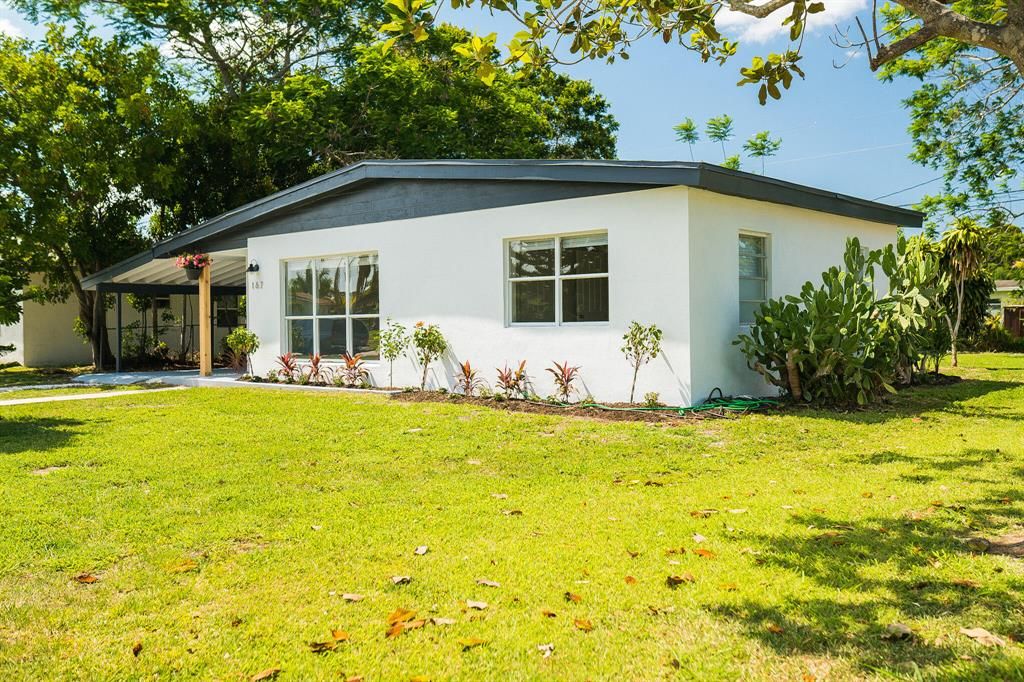 Photo of 167 SE Lucero Drive Dr, Port St Lucie, FL 34983 (MLS # R10798959)