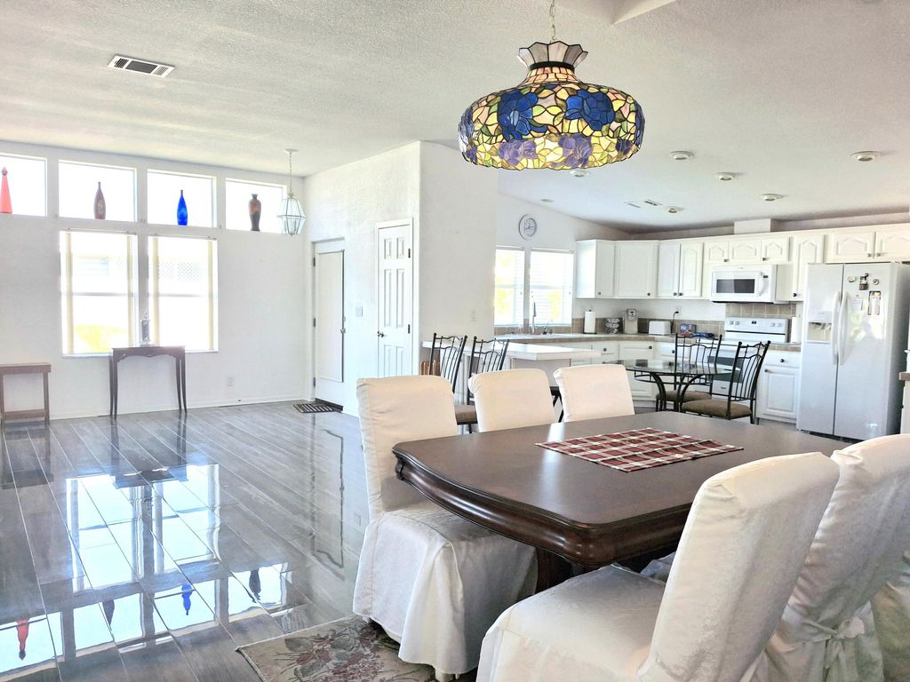 Photo of 8027 9th Hole Drive, Port Saint Lucie, FL 34952 (MLS # R11133151)