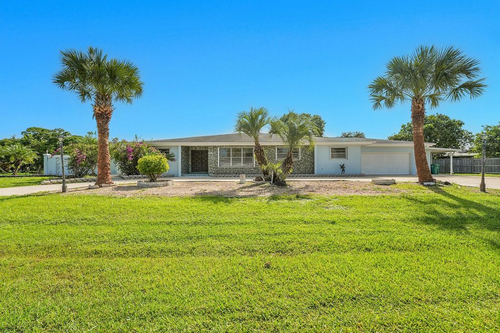 Photo of 154 N Naranja Avenue, Port St Lucie, FL 34983 (MLS # R11117932)