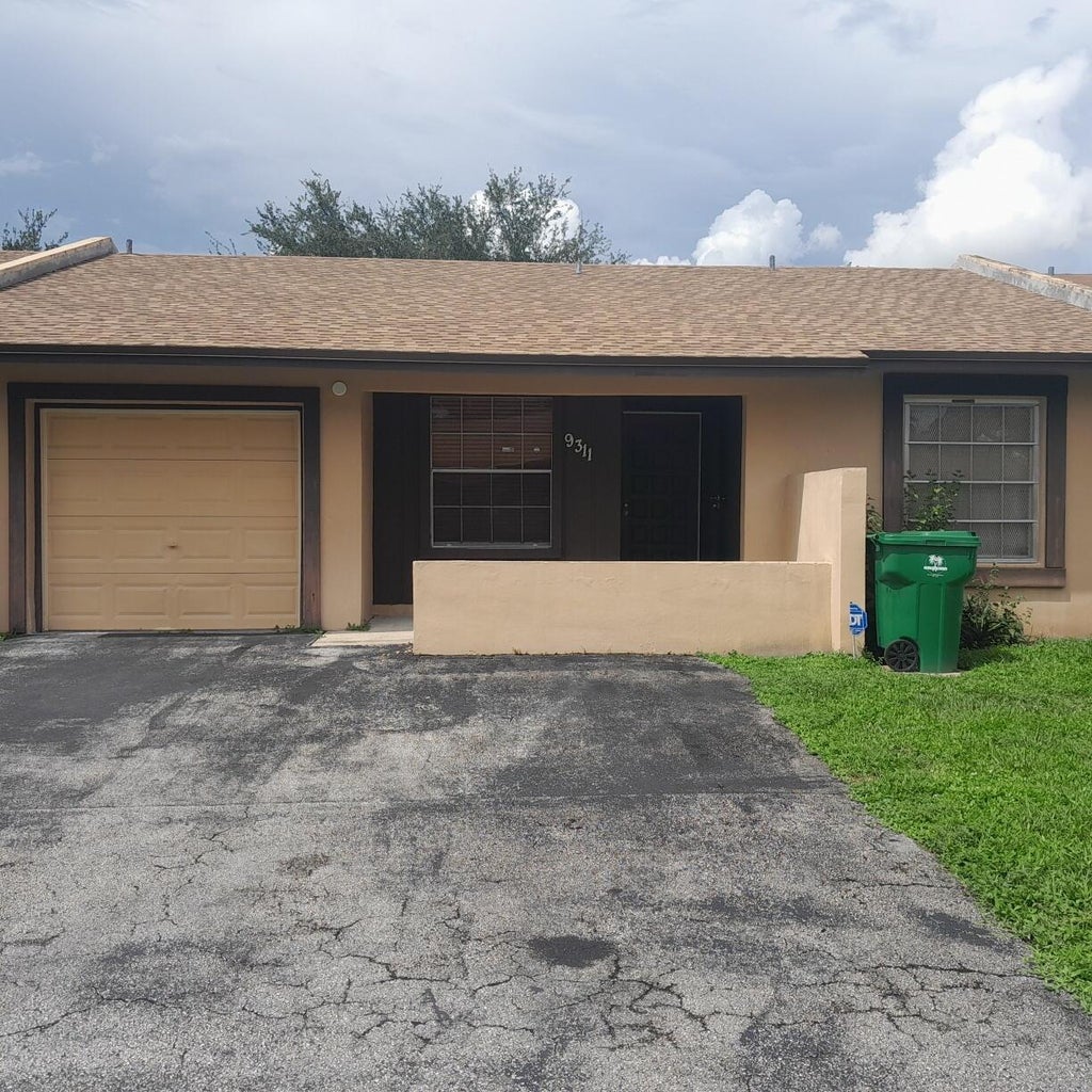 Photo of 9311 E HEATHER Lane, Miramar, FL 33025 (MLS # B26070721)