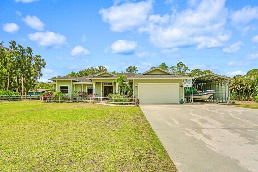 Photo of 13104 158 Street N, Jupiter, FL 33478 (MLS # R11084142)