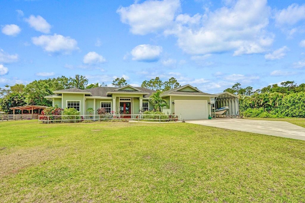 Photo of 13104 158 Street N, Jupiter, FL 33478 (MLS # R11084142)