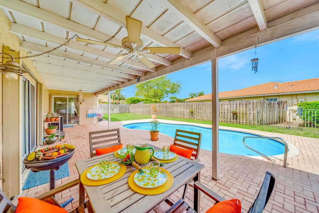 Photo of 6161 Woodbury Road, Boca Raton, FL 33433 (MLS # R10974262)