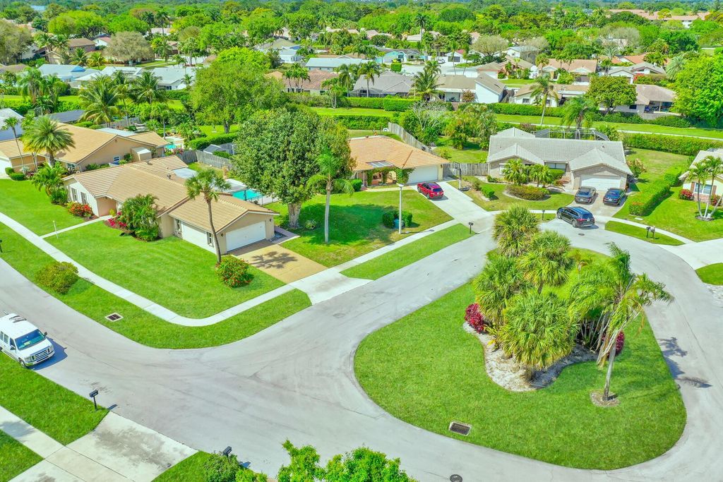 Photo of 6161 Woodbury Road, Boca Raton, FL 33433 (MLS # R10974262)