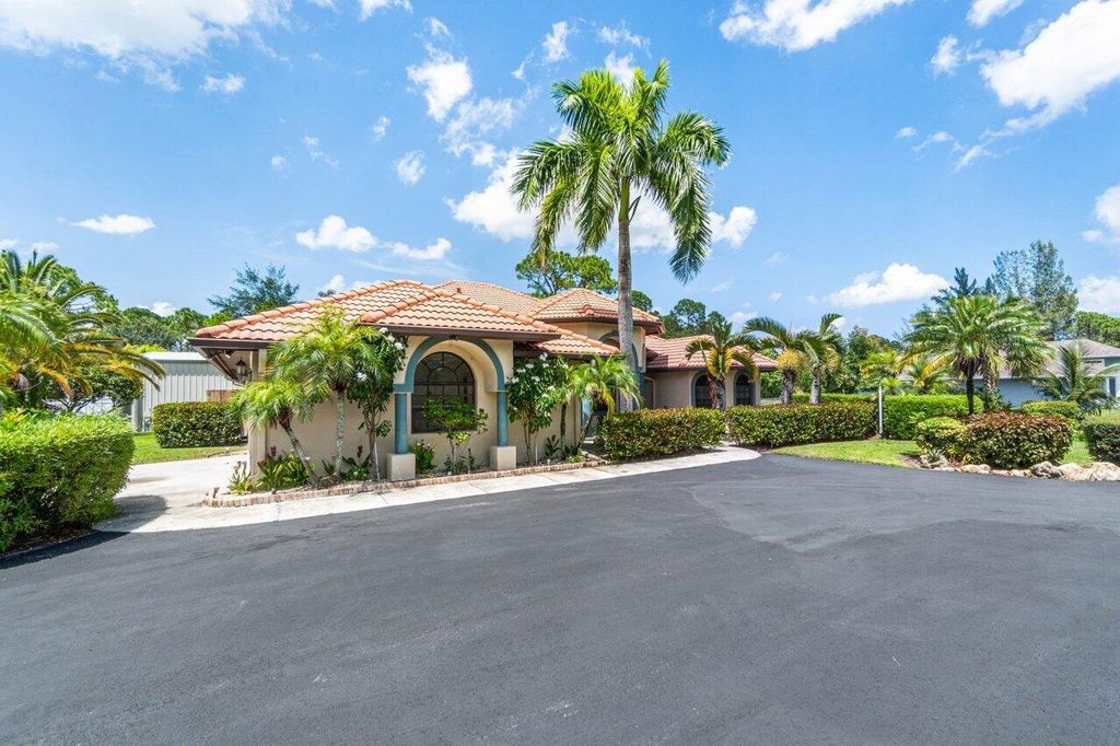 Photo of 11415 51st Court N, West Palm Beach, FL 33411 (MLS # R11012785)