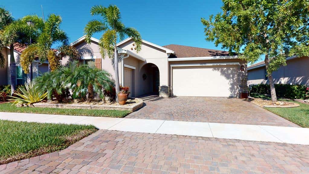 Photo of 10235 SW Fernwood Avenue, Port Saint Lucie, FL 34987 (MLS # R10757410)