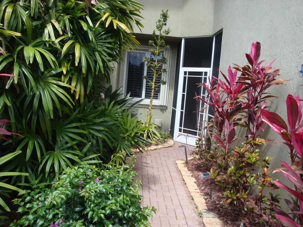 Photo of 5736 NW 127th Terrace, Coral Springs, FL 33076 (MLS # B26019043)